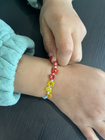 Bracelet fleurs en perles