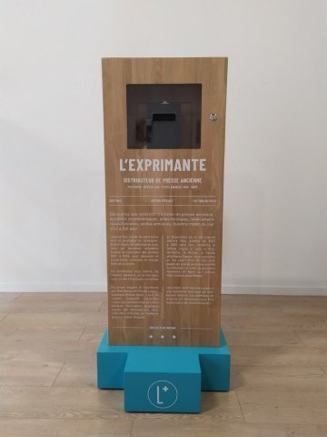Distributeur de presse ancienne