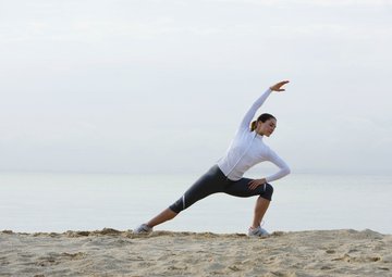 Séance de streching sur la plage